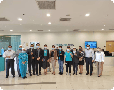 Columbia Asia Hospital kiosk team photo Malaysia